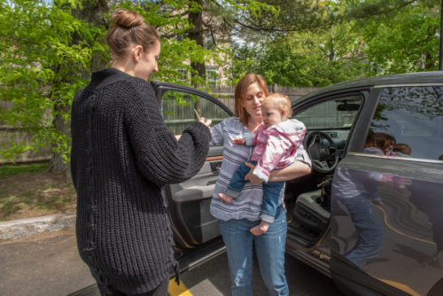 1 – mom getting the parking pass